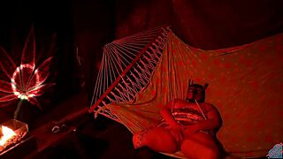 getting frisky in a tent fingering her wet hole in a hammock!!