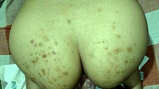 Video of Beautiful Brunette Relaxing on the Sofa