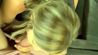 Amateur couple engages in ass licking, rimjob, and footjob in parked car.