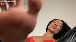 She kicks you in the face and spits on you during femdom humiliation