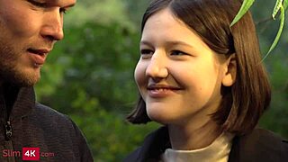 Skinny teen walks with boyfriend.