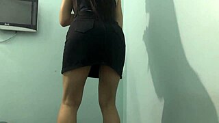The college girl does an ass workout wearing a skirt
