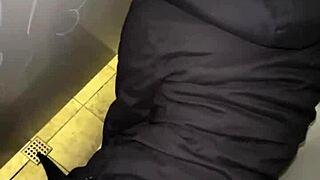 Couple caught in public restroom incident.