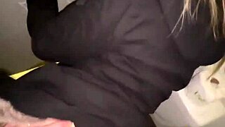 Couple caught in public restroom incident.