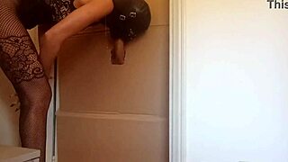 In A Nylon Catsuit And High Heels, I Suck A Cock And Fuck It In A Gloryhole Until It Cums In My Mouth