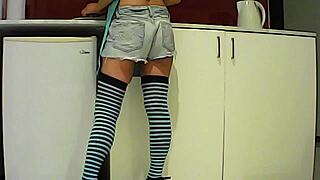 Latina brunette eats banana in kitchen then sucks big cock