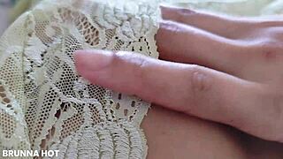 Watch her insert a dildo into her wet pussy in bed