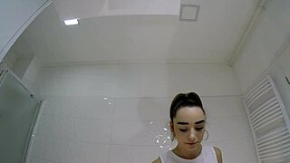 Hot Brunette College Girl With A Mini Tennis Skirt And Over Knee Socks In The Bathroom Shows Panties Under Her Short Skirt And Goes Also No Panties