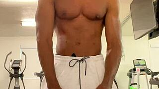 Black bodybuilder works out neck and shoulders outdoors in California for ladies.