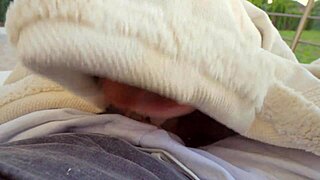 in the backyard, she risks a public swallow as neighbors might see any moment