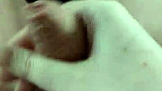 at home alone, I stroke my big cock slowly, feeling every inch