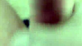 at home alone, I stroke my big cock slowly, feeling every inch