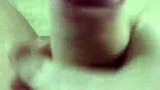 at home alone, I stroke my big cock slowly, feeling every inch