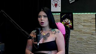 A tattooed brunette reveals her big tits during truth or dare, then shares stories about her friend's dick and sex experiences.