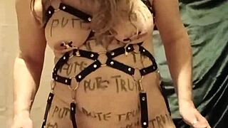 i am a slave in self-bondage with harness and magic wand