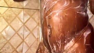 the ebony babe receives a golden shower outdoors