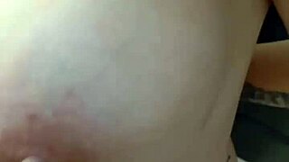 Amateur with huge porn size implants titfucks for first time in a hotel bathroom.