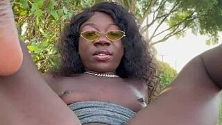 Lola black xxx plays with her pussy outside in public dorm area with toys and feet