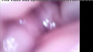 The milf gently caresses her anal area, then reveals her pussy inside and pees.