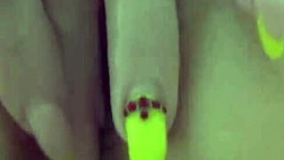 The milf gently caresses her anal area, then reveals her pussy inside and pees.