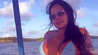 Brazilian latina wife rides boat in bikini