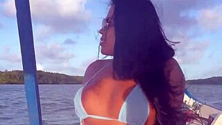 Brazilian latina wife rides boat in bikini