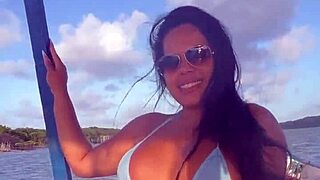 Brazilian latina wife rides boat in bikini