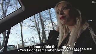 Blonde with red lips sucks cock in car