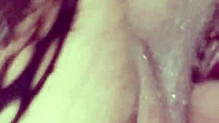 Playing with mature neighbor's pussy using huge dildo making her cum in spurts