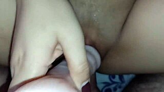 Woman enjoys double vaginal penetration with dildo