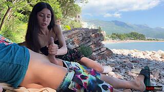 Public dick flashing on the beach makes me take it in my hand and help him cum.