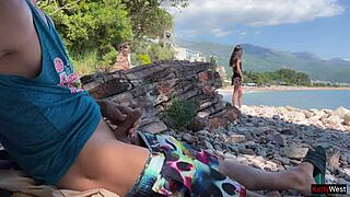 Public dick flashing on the beach makes me take it in my hand and help him cum.