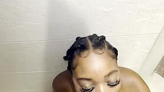 Thick ebony babe deepthroats monster cock then fucked rough in shower cumshot facial