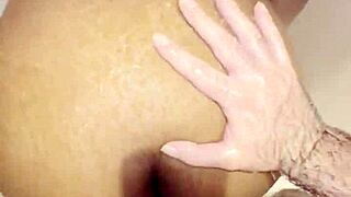 Thick ebony babe deepthroats monster cock then fucked rough in shower cumshot facial