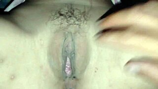 her tight pussy lips part as cock teases her swollen clit before sliding in