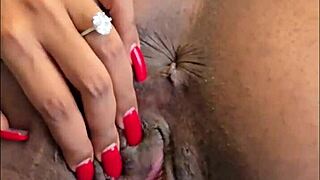 damn this ebony slut spreads shaved pussy fingers clit til she moans orgasming