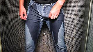 Guy Boldly Pees in Jeans for Explosive Cumshot Finish
