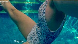 wife flashes big tits hot one-piece swims hotel pool voyeur