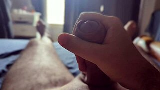 stroking my monster cock with sun rays on bedroom window