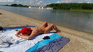 Ariela Rider flashes shaved pussy and rides cock publicly on Danube bank