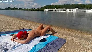 Ariela Rider flashes shaved pussy and rides cock publicly on Danube bank