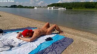 Ariela Rider flashes shaved pussy and rides cock publicly on Danube bank