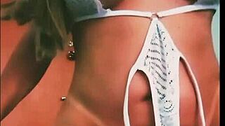 Blonde milf in sex shop lingerie parades sensual outfits with massive cock tease!!