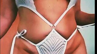 Blonde milf in sex shop lingerie parades sensual outfits with massive cock tease!!