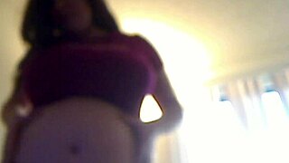 Her plump belly jiggles while stuffing azzmiss ice cream into big latina ass