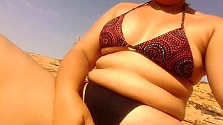 big ass latina ebony gets so horny flashing curves then masturbates hard on sunny beach