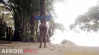 i love teasing on the beach in my swimsuit before dropping to suck his ebony cock hard