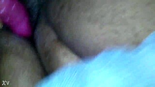 this sexy ebony bbw spreads her hairy pussy wide playing with vibrator on those big tits