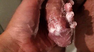 Hot stepbrother shower handjob while wife away!