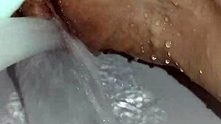gretala rubs soapy bar over her smooth trimmed pussy closeup